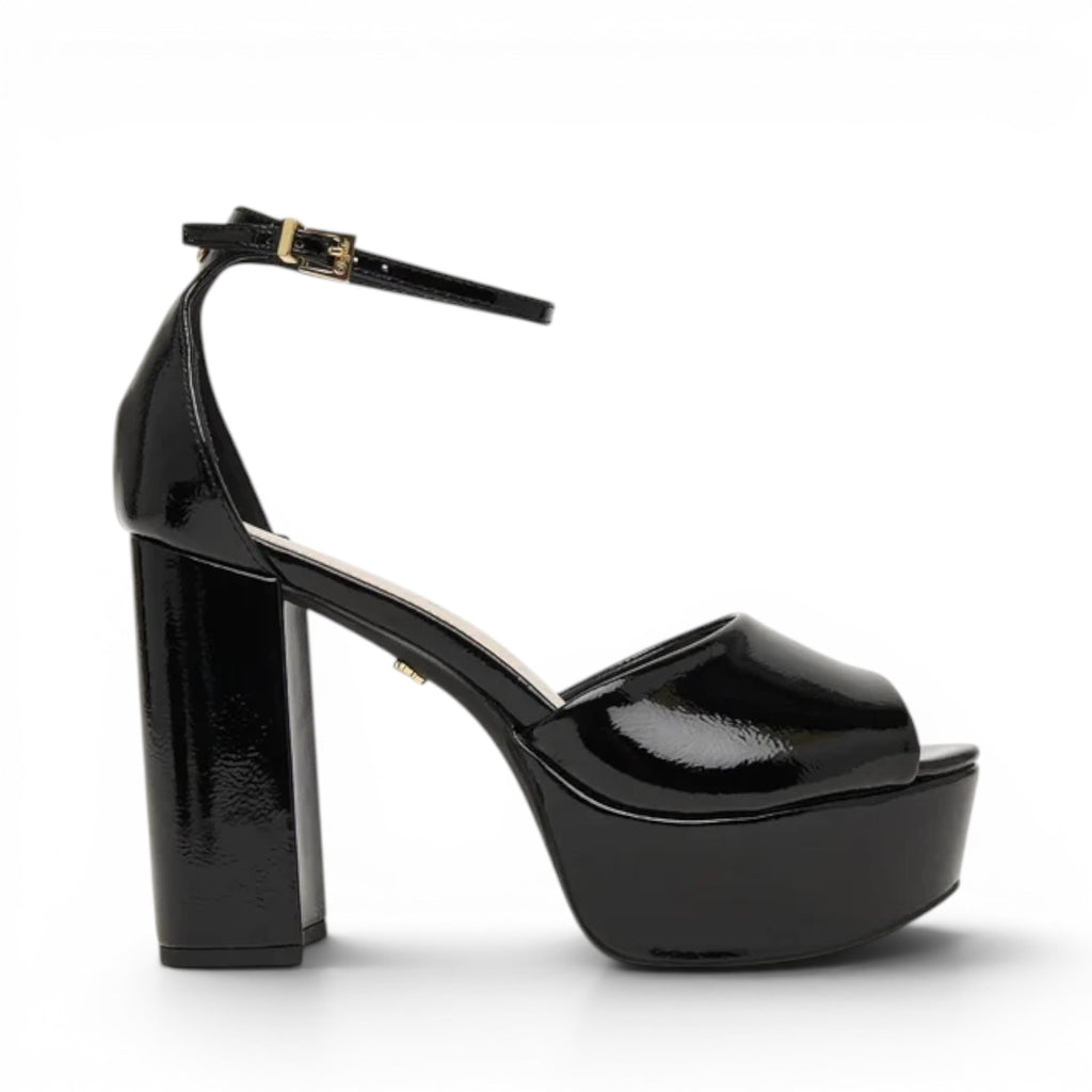 ShoeShop Jessie Neat black patent platform sandals with ankle strap and chunky heel.