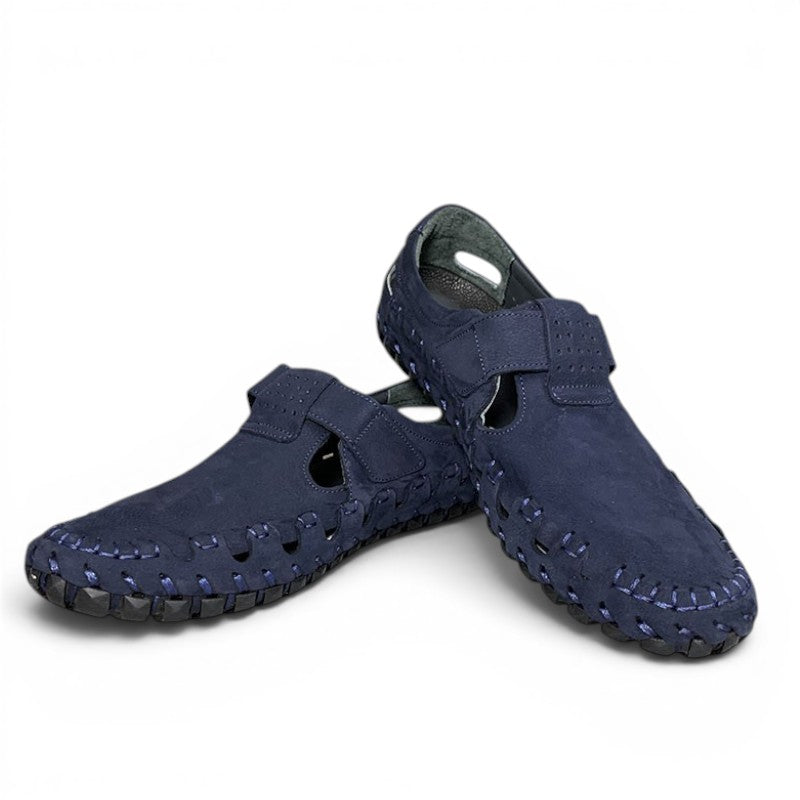 ShoeShop dark blue suede fisherman sandals with woven detail and adjustable strap.