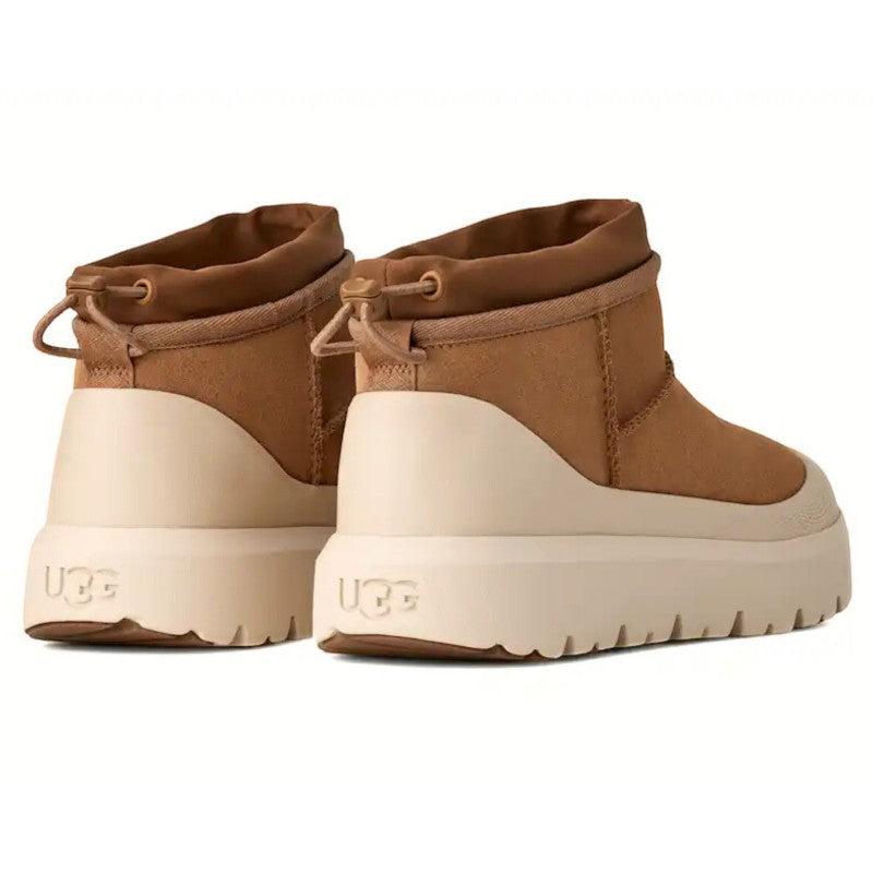 ShoeShop UGG Classic Ultra Mini Weather Hybrid boots in tan waterproof suede with cream sole and toggle closure.