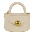 ShoeShop beige leather handbag with a rounded top handle, gold magnetic button closure, and detachable shoulder strap.