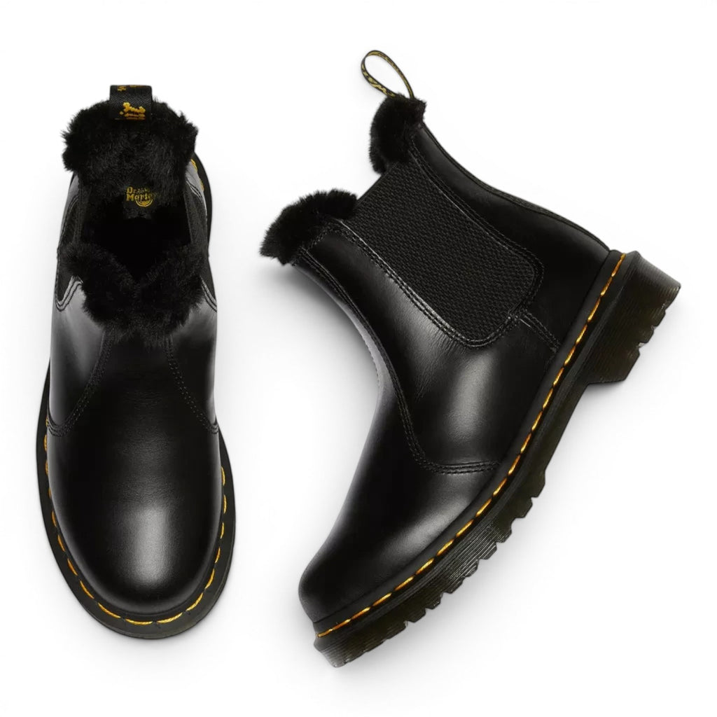 ShoeShop black leather Dr. Martens Chelsea boots with faux fur lining and yellow welt stitching