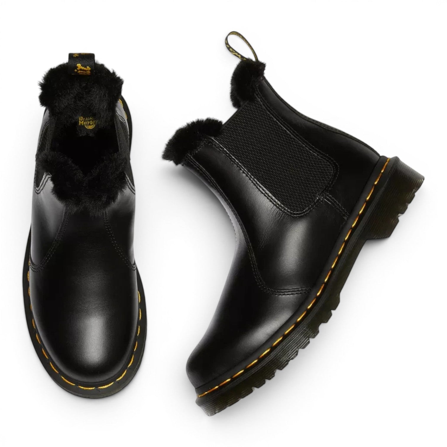 ShoeShop black leather Dr. Martens Chelsea boots with faux fur lining and yellow welt stitching