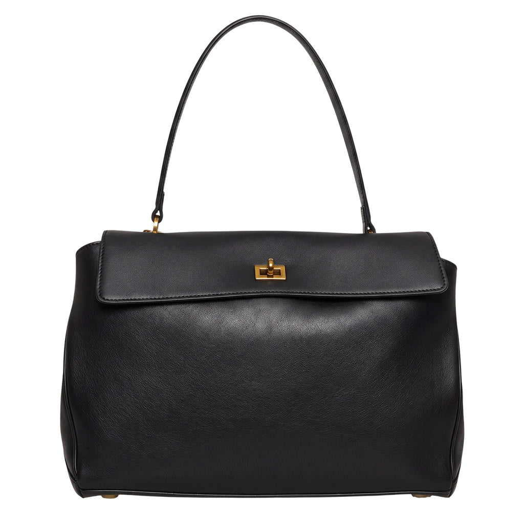 ShoeShop black leather handbag with a top handle and gold-tone metal turn-lock closure
