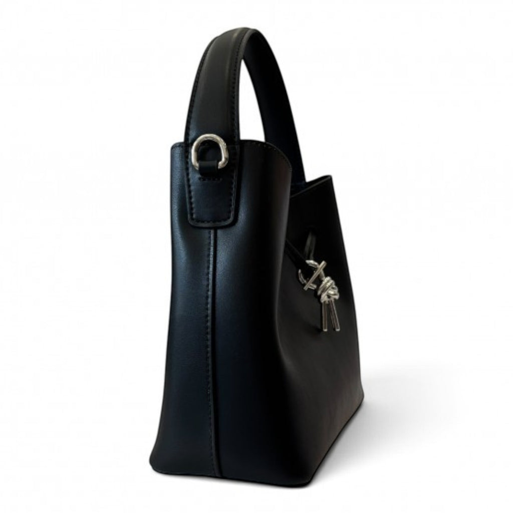 ShoeShop W1129 black leather handbag with a knot detail, magnetic closure, and removable shoulder strap