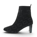ShoeShop black textile ankle boots with a geometric pattern and 6cm block heel.