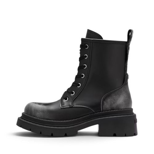 ShoeShop Buffalo 18332 black synthetic lace-up combat boot with a chunky TPR lug sole and distressed finish