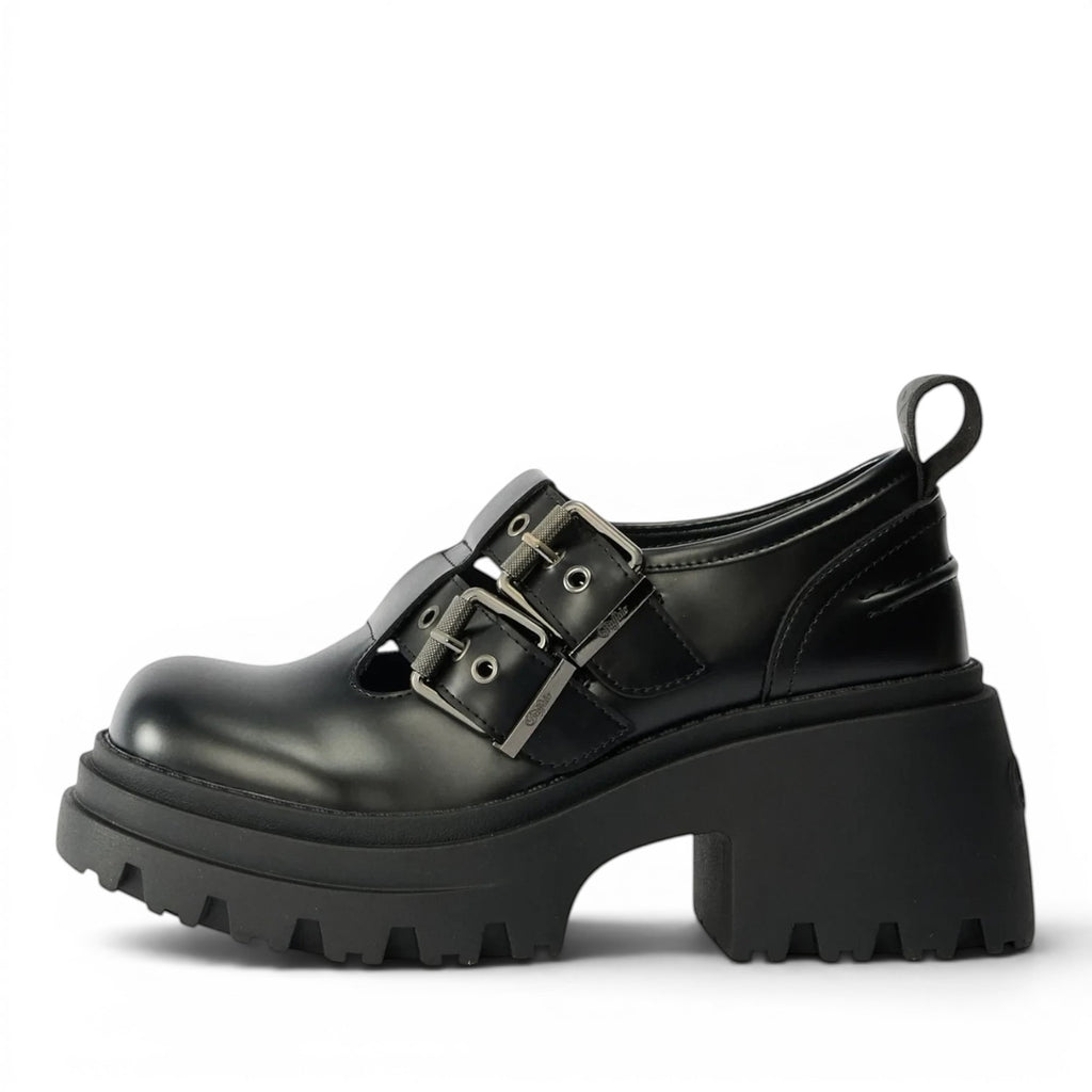 Buffalo 1624090 black faux leather Mary Jane platform shoes with double buckle straps and lug sole.