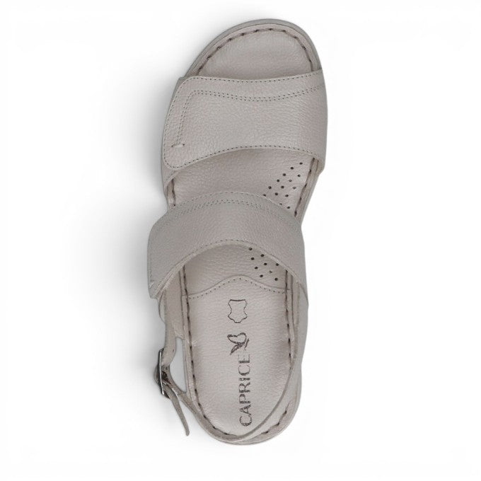 ShoeShop Caprice beige leather sandals with adjustable velcro straps and a comfortable cushioned footbed.