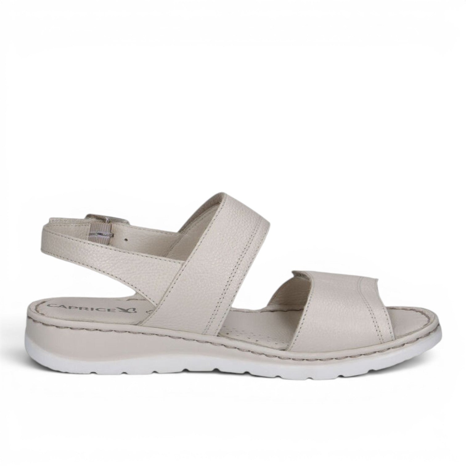 ShoeShop Caprice beige leather sandals with two straps, adjustable buckle, and comfortable flat white sole.