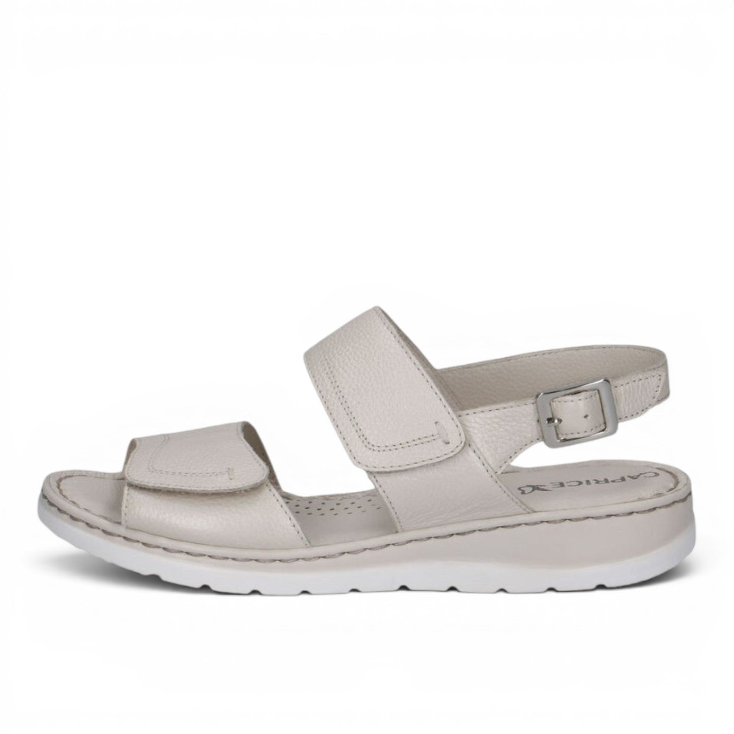 ShoeShop Caprice beige leather sandals with adjustable hook-and-loop straps and a comfortable white flat sole.