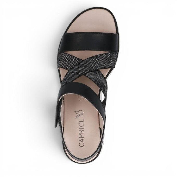 ShoeShop Caprice black sandals with crisscross glitter straps and a comfortable cushioned footbed.