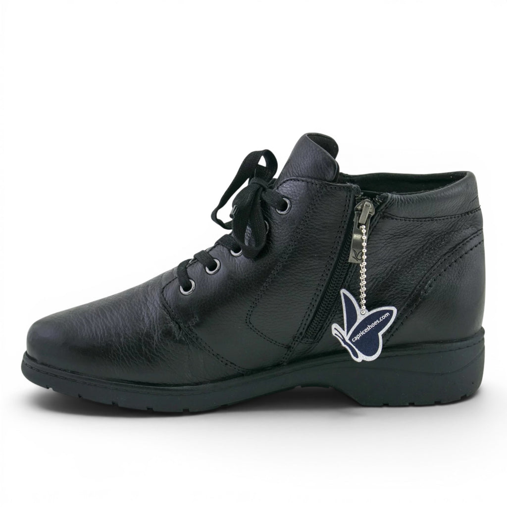 ShoeShop Caprice black leather ankle boots with side zipper, lace-up closure, and comfortable flat sole.