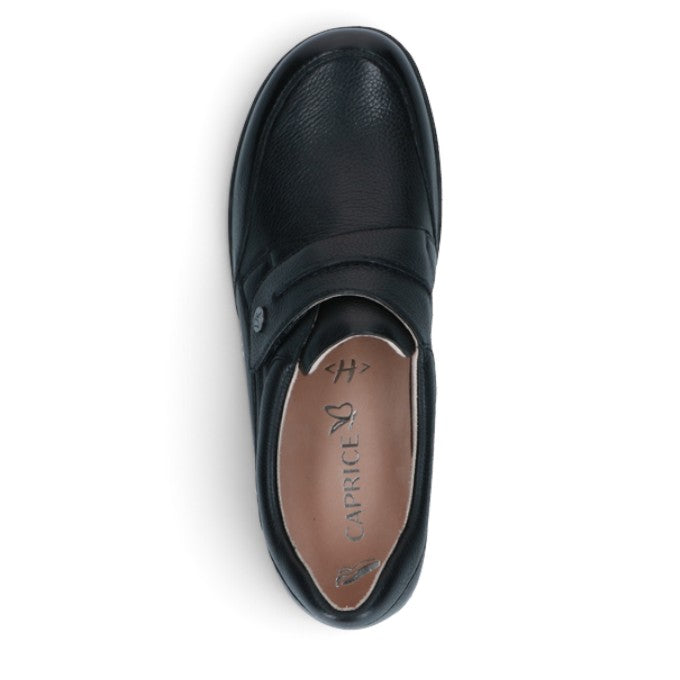 ShoeShop Caprice black leather wide fit H-width slip-on shoe with rubber sole, top-down view