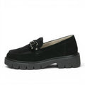 ShoeShop Caprice black textile loafers with a chunky rubber lug sole, metal hardware detail, and removable leather insole