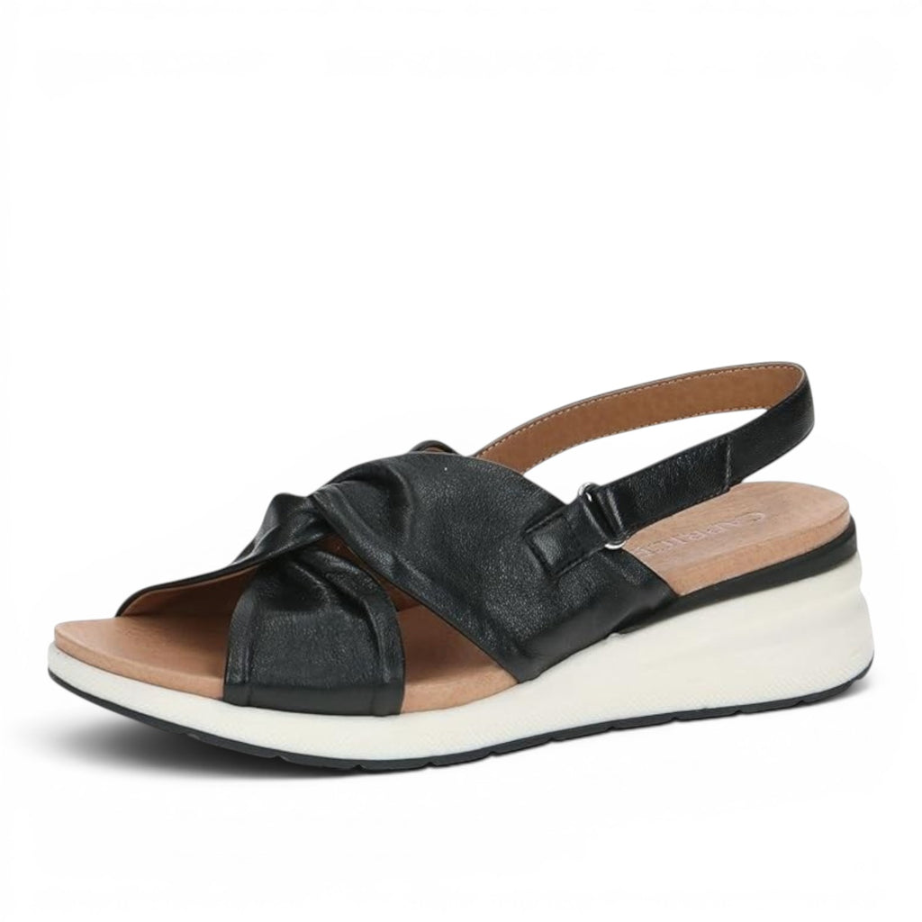 ShoeShop Caprice black leather wedge sandals with a knotted strap design and adjustable slingback strap.
