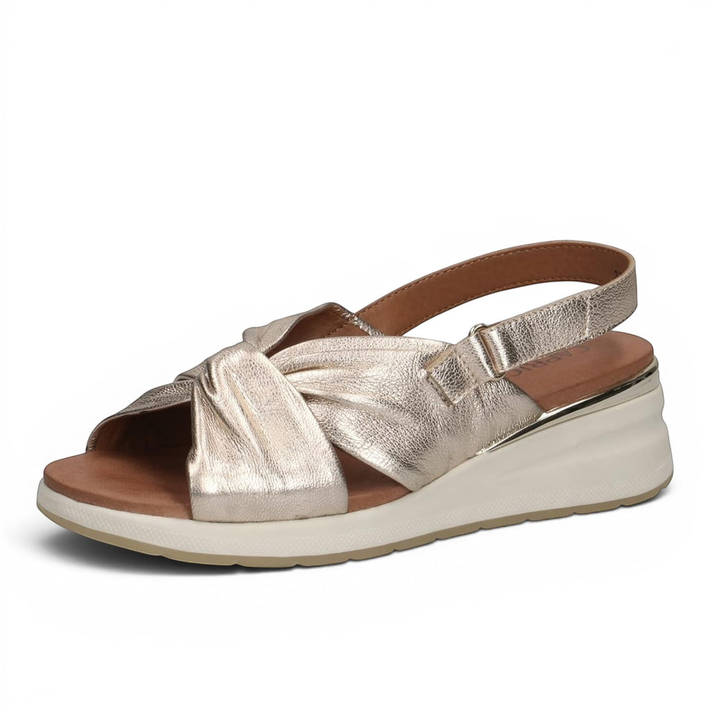 ShoeShop Caprice metallic gold leather wedge sandals with a knotted strap design and adjustable slingback strap.