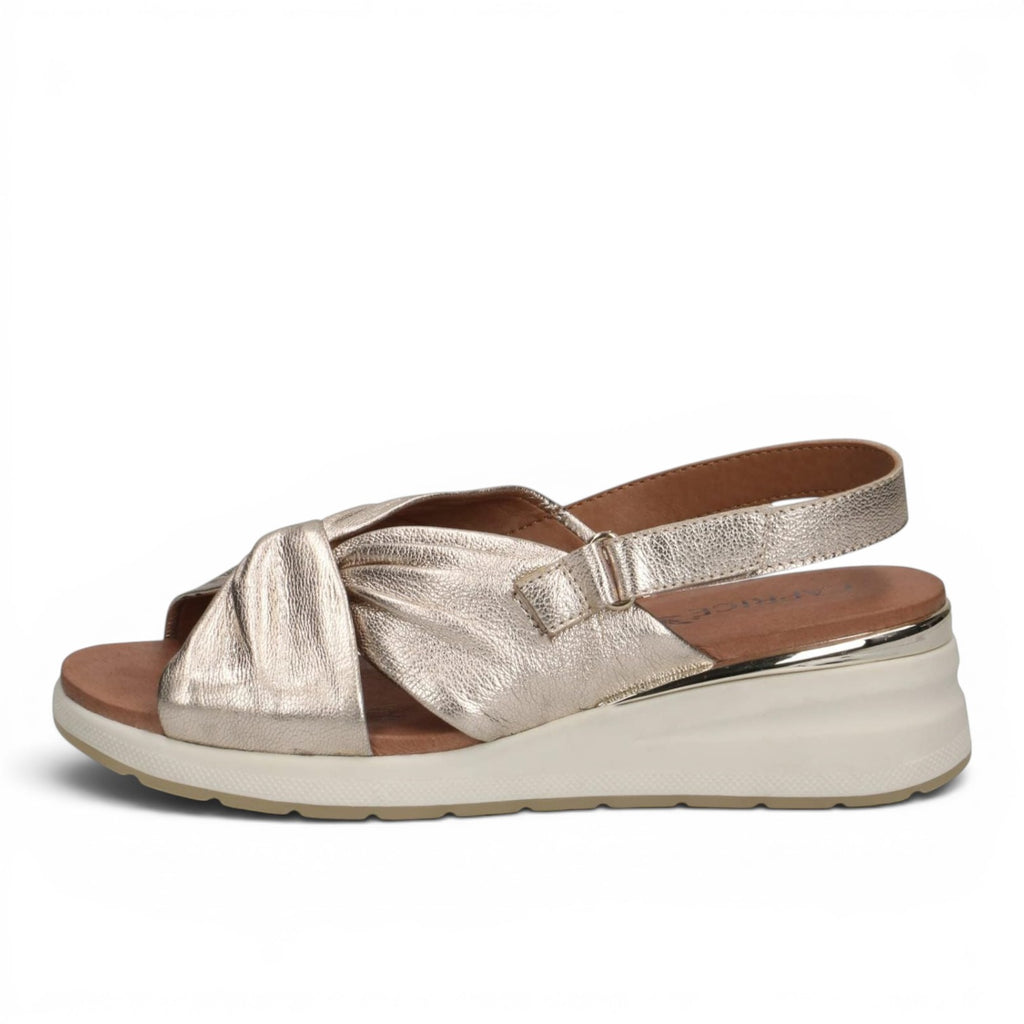 ShoeShop Caprice metallic gold leather wedge sandals with a knotted strap design and adjustable slingback strap.