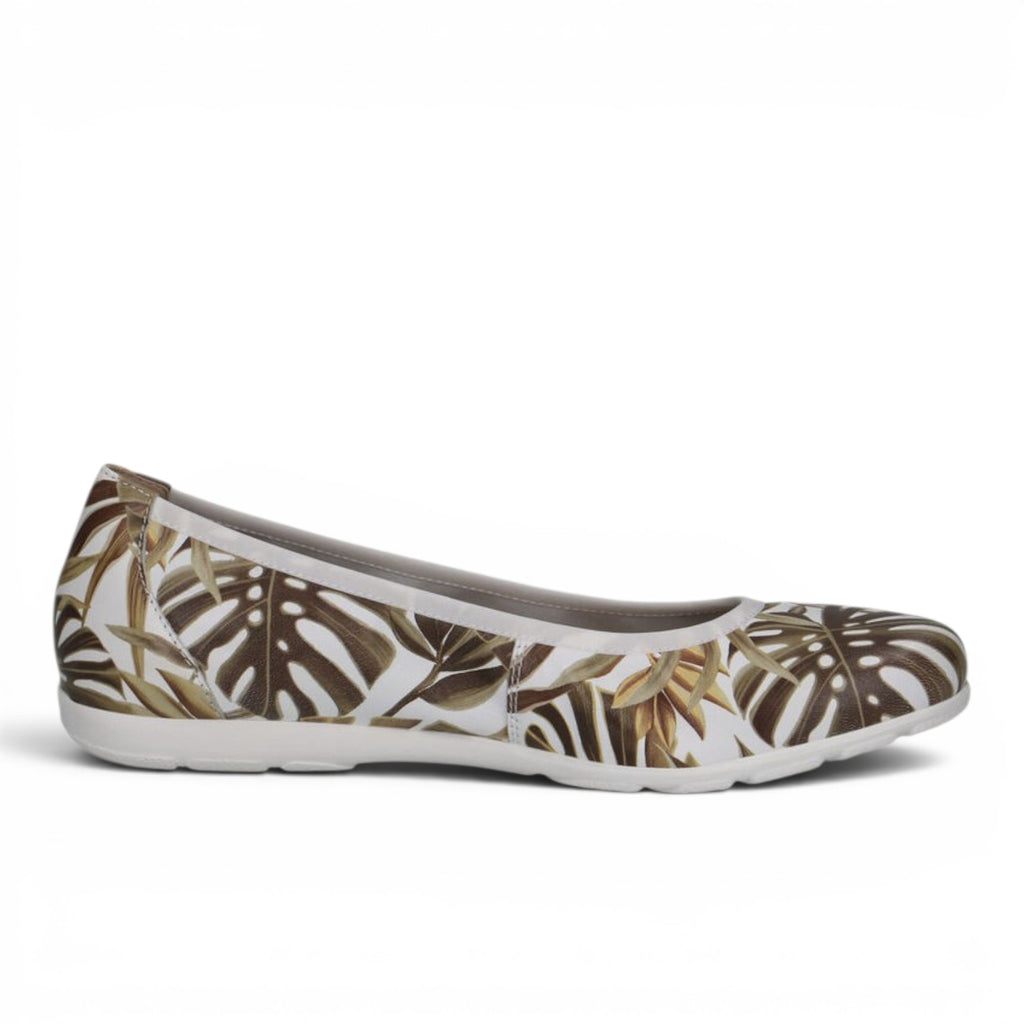 ShoeShop Caprice ballerina flats featuring a white base with a tropical brown leaf print and a comfortable flat sole.