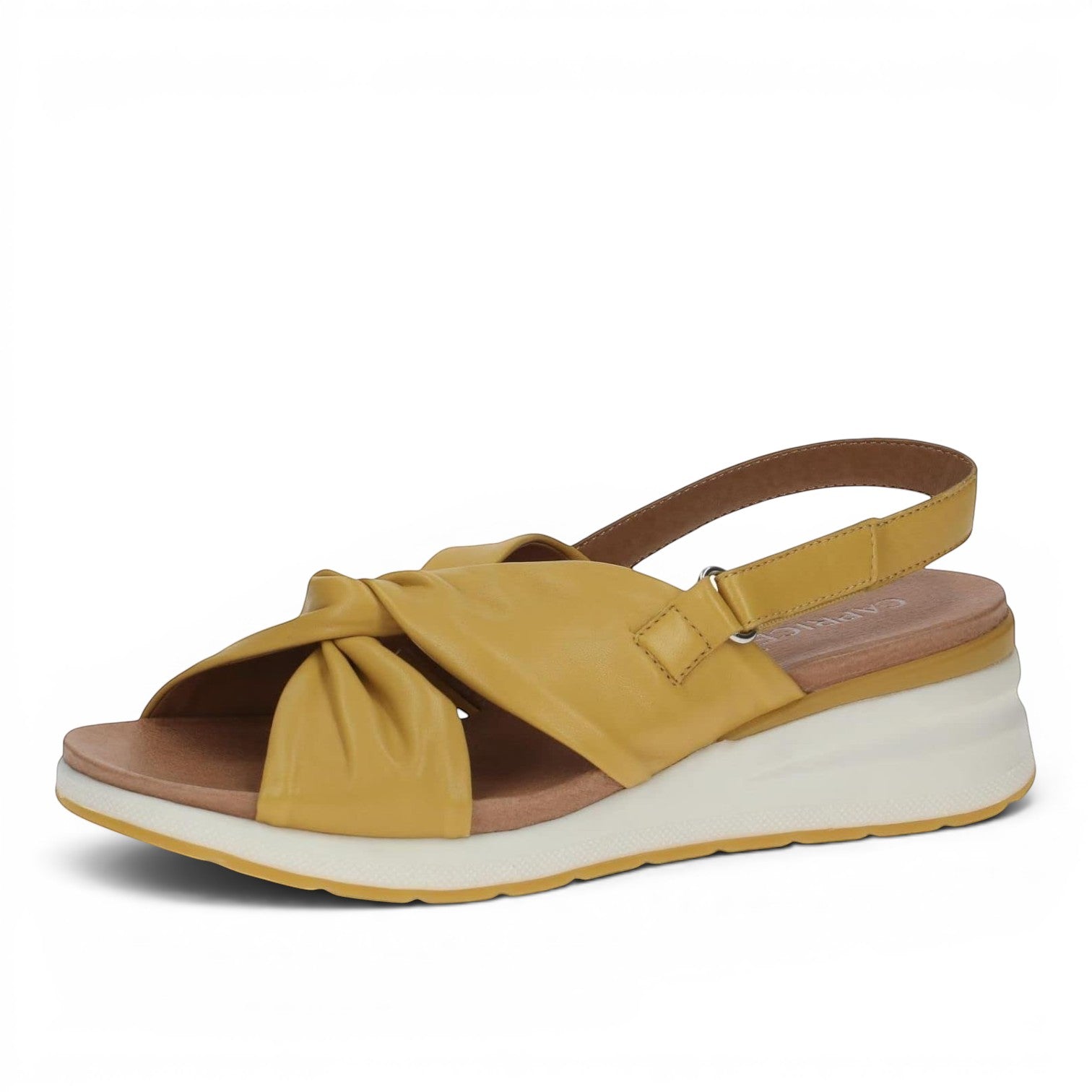 ShoeShop Caprice mustard yellow leather wedge sandals with a knotted front strap and adjustable slingback closure.