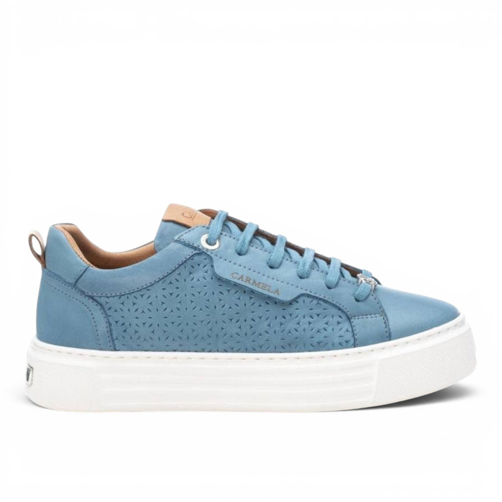ShoeShop Carmela 160558 blue leather sneakers with laser-cut geometric patterns and a thick white platform sole.