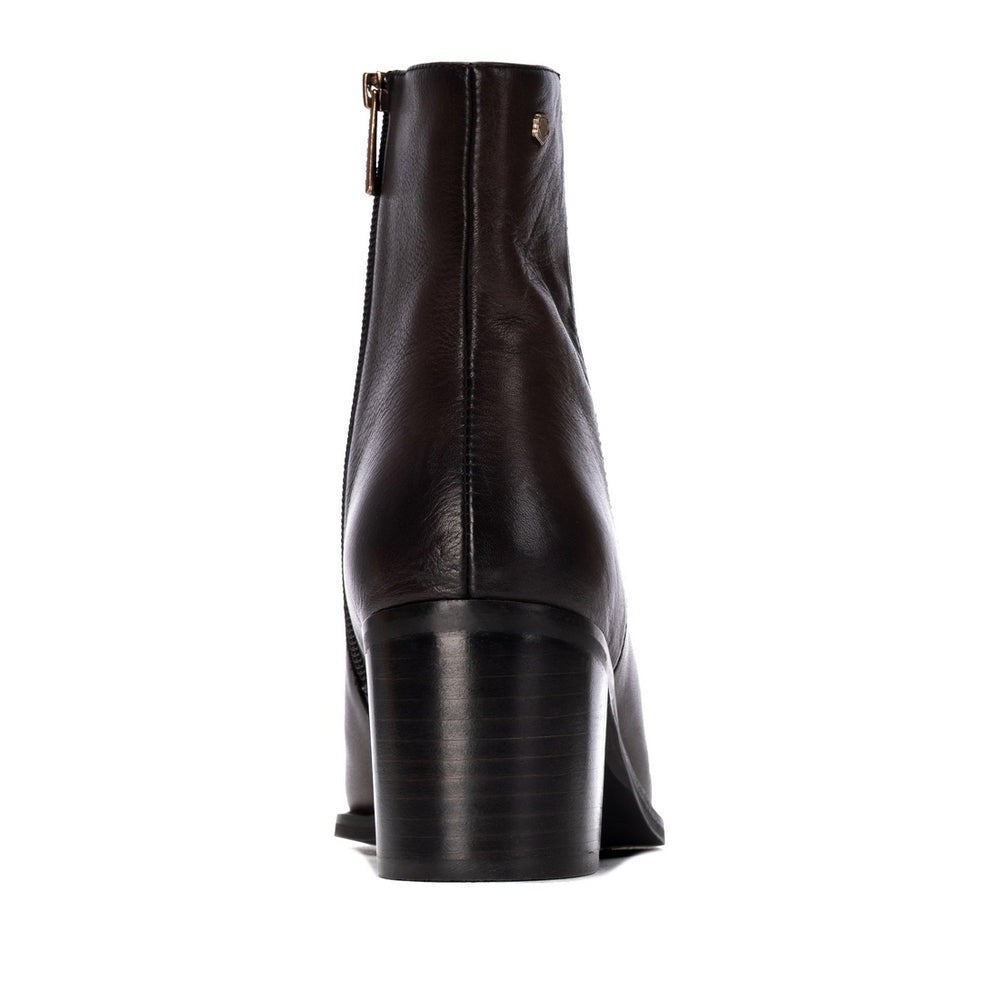 ShoeShop Carmela leather ankle boots in black with a side zipper and a 6.5cm block heel, rear view.