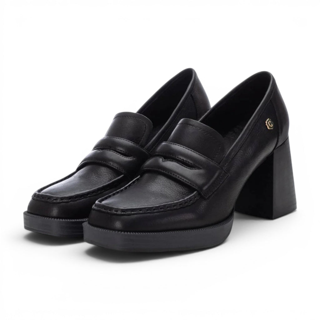 ShoeShop Carmela 161218 black leather heeled loafers with a chunky block heel and gold logo detail.
