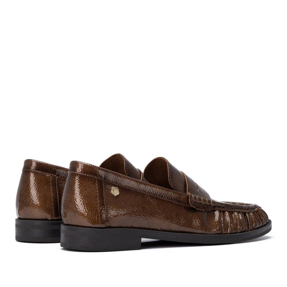 ShoeShop Carmela brown patent leather loafers with a classic design and durable rubber sole