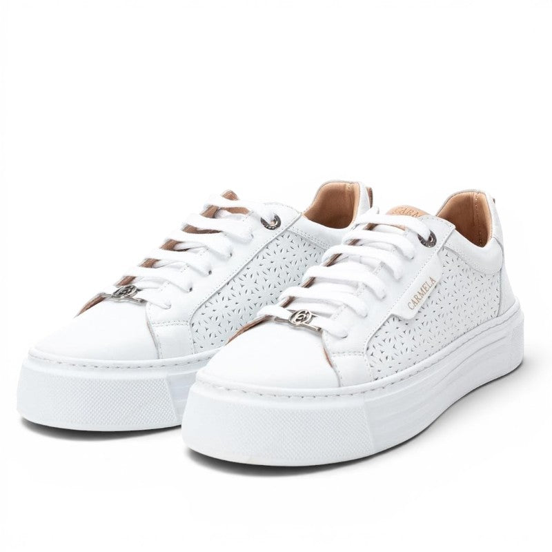 ShoeShop Carmela 160558 white leather platform sneakers with laser-cut floral detailing and lace-up closure.