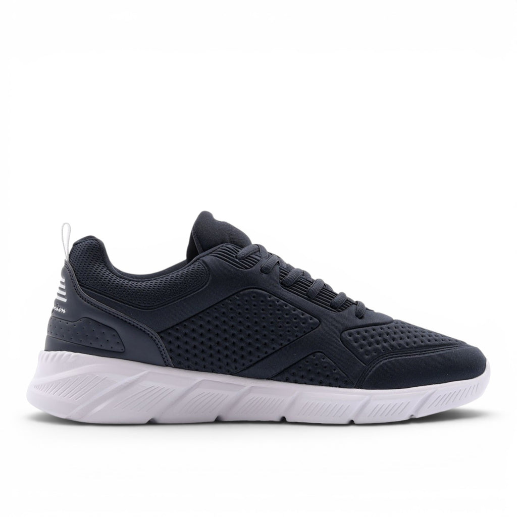 ShoeShop Champion Jolt sneakers in dark navy blue with a breathable mesh upper and white athletic sole