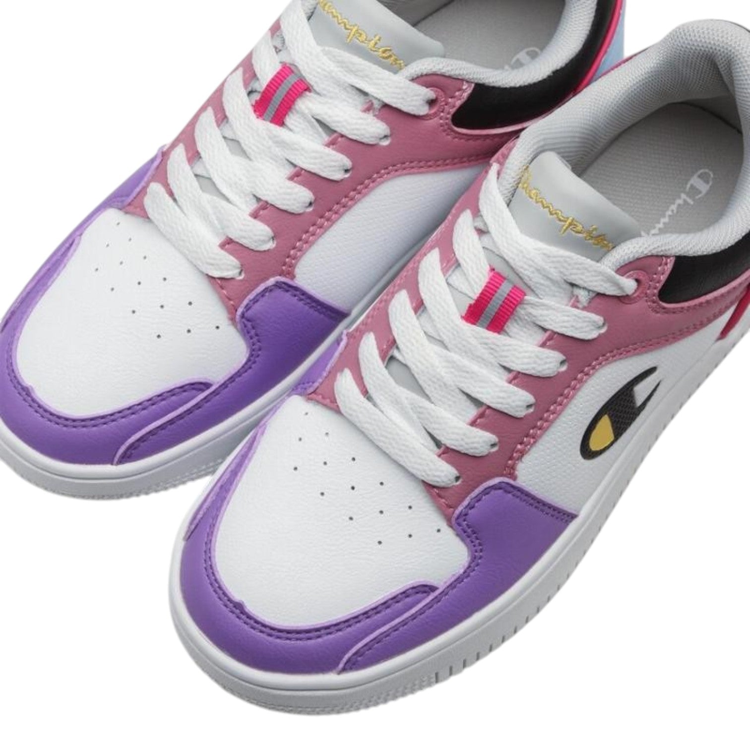 ShoeShop Champion Rebound 2.0 Low sneakers in white, pink, and purple synthetic leather with a durable rubber sole.