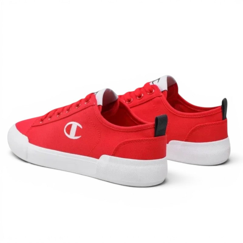 ShoeShop Champion S21856 red canvas low-top sneakers with white rubber soles and logo detail