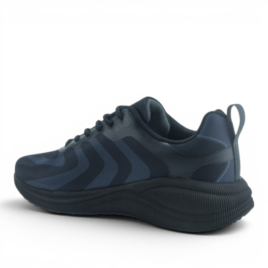 ShoeShop Champion S22308 dark blue athletic sneakers with a textured black sole and lace-up design.