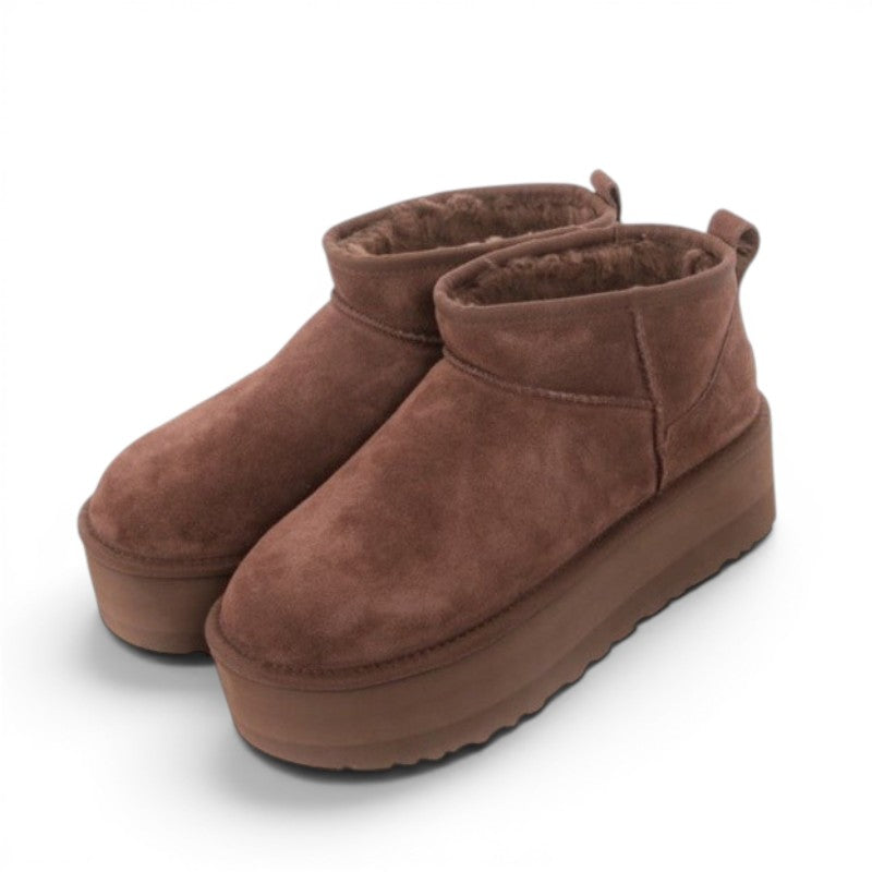 ShoeShop brown suede Classic Ultra Mini Platform boots with a 5cm sugar cane EVA sole and recycled wool lining.