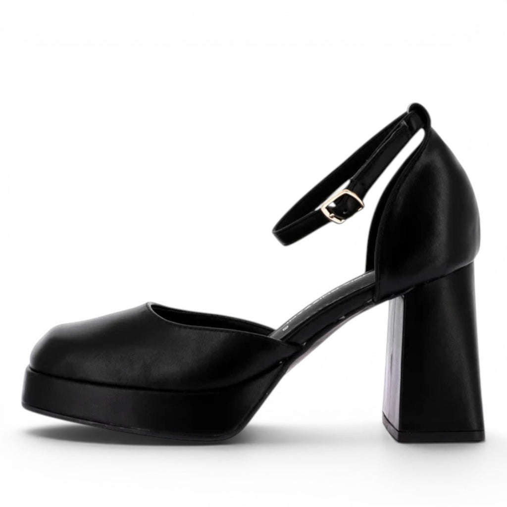 ShoeShop Claudia Ghizzani black platform heels with a square toe, block heel, and adjustable ankle strap.