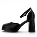 ShoeShop Claudia Ghizzani black platform heels with a square toe, block heel, and adjustable ankle strap.