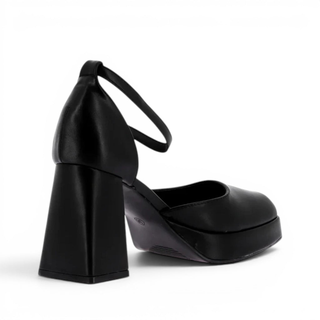 ShoeShop Claudia Ghizzani black platform heels with a chunky block heel and ankle strap closure.