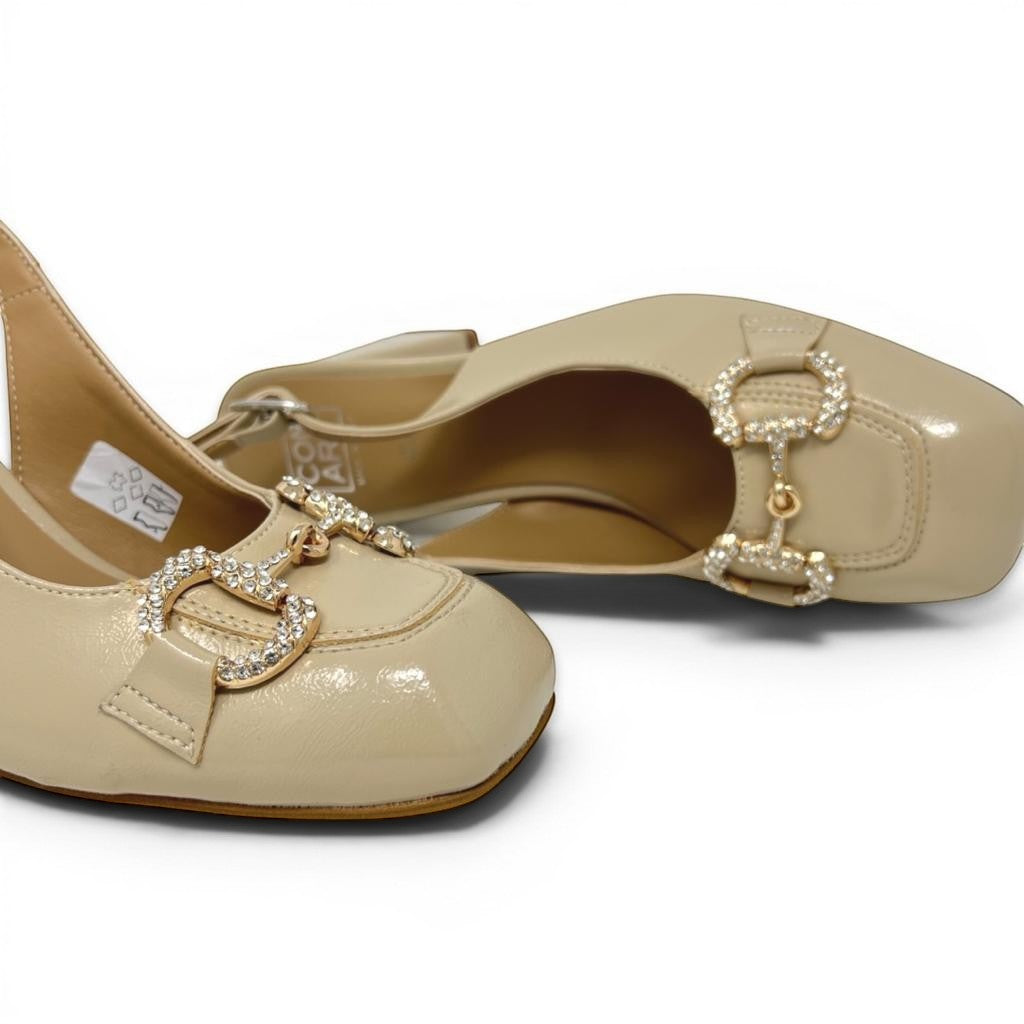 ShoeShop Comart 6G4637 beige patent leather slingback heels with square toe and decorative crystal horsebit detail.