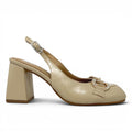 ShoeShop Comart 6G4637 beige patent leather slingback heels with a block heel and decorative crystal-embellished buckle.