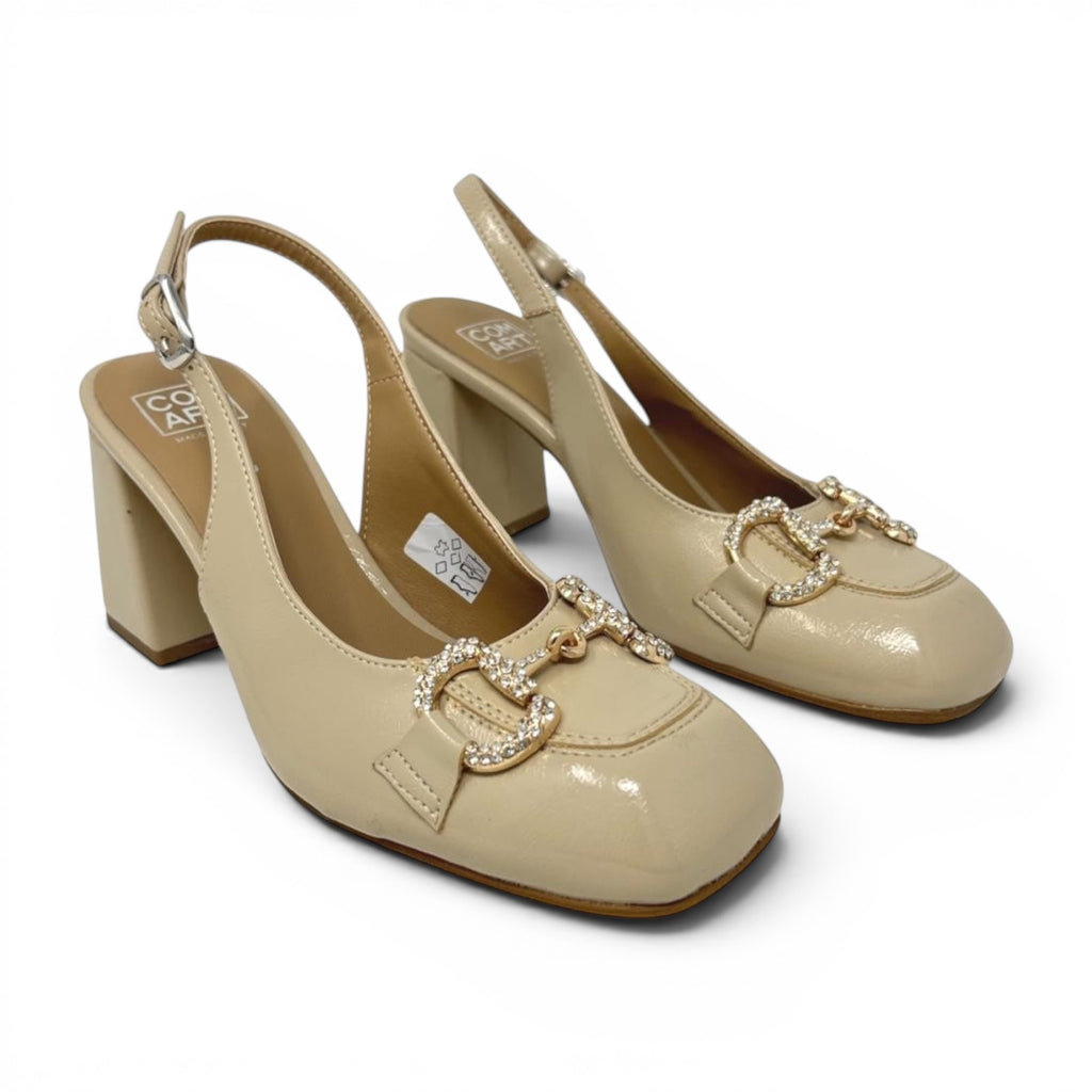 ShoeShop Comart 6G4637 beige patent leather slingback heels with block heel and rhinestone embellished buckle detail.