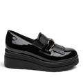 ShoeShop Comart black patent leather platform loafers with fringe detail, metal hardware, and 5cm rubber wedge sole.