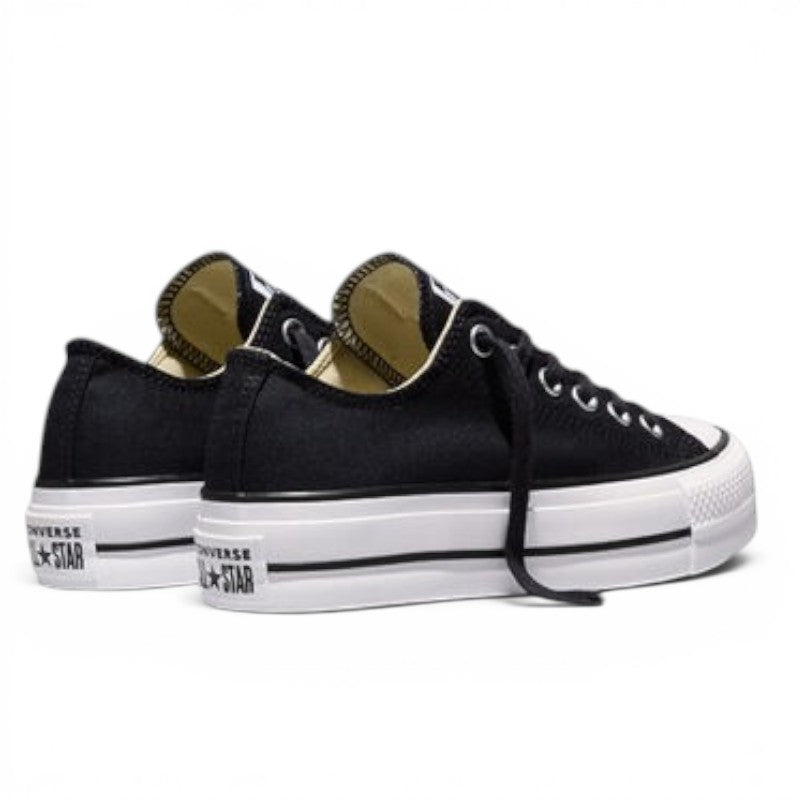 ShoeShop Converse 560250C black canvas low-top platform sneakers with white rubber soles and All Star branding.
