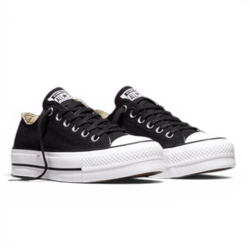 ShoeShop Converse 560250C black canvas low-top platform sneakers with white rubber soles and lace-up closure.