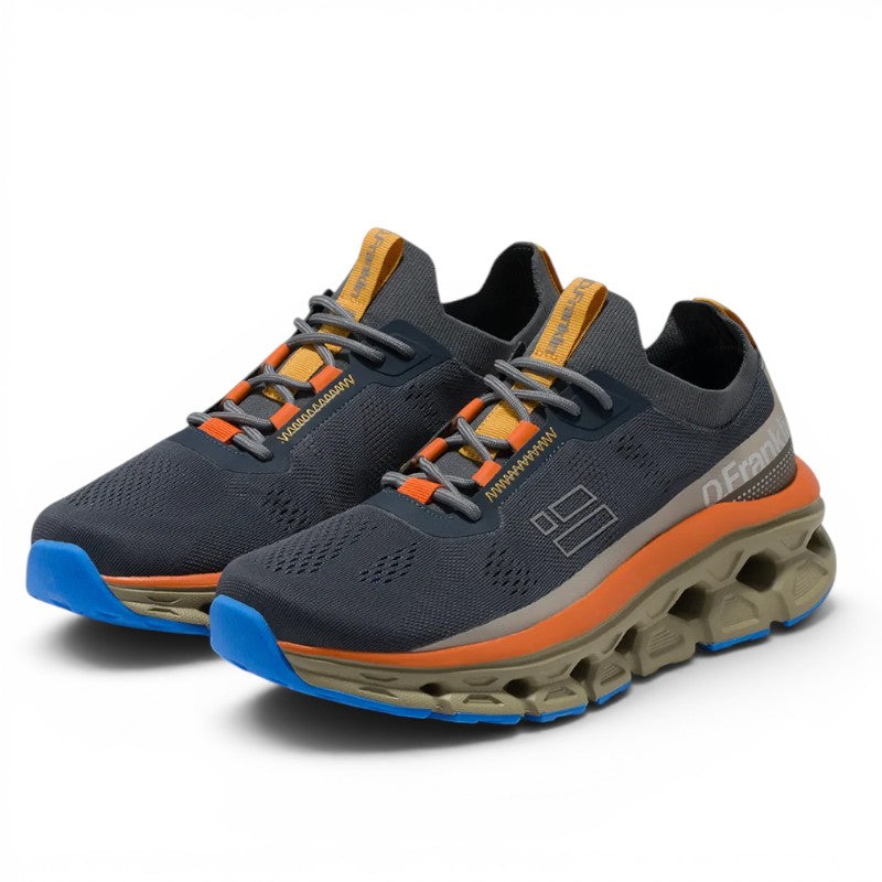 ShoeShop D.Franklin 401001 sneakers in dark grey with orange accents, blue outsoles, and chunky beige midsoles.