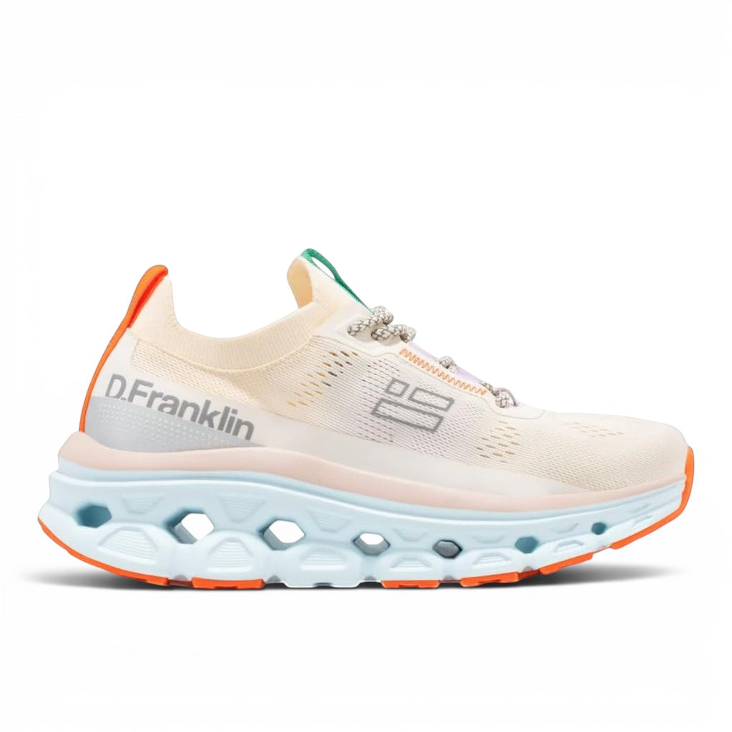 ShoeShop D.Franklin Aero sneakers in cream with orange accents, featuring a chunky cutout sole and breathable knit.
