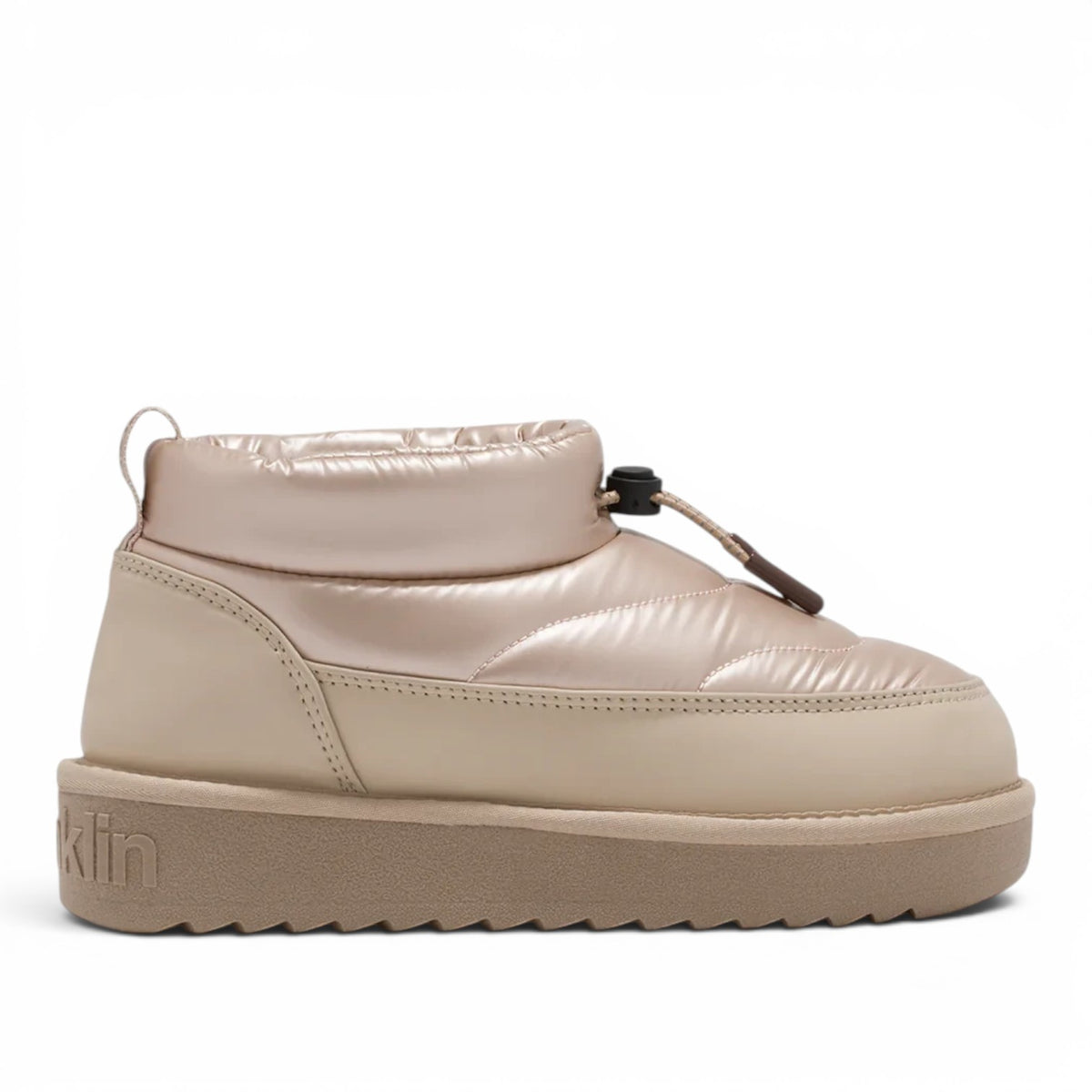 ShoeShop D.Franklin 370016 beige quilted puffer ankle boots with a thick platform sole and toggle lace closure.