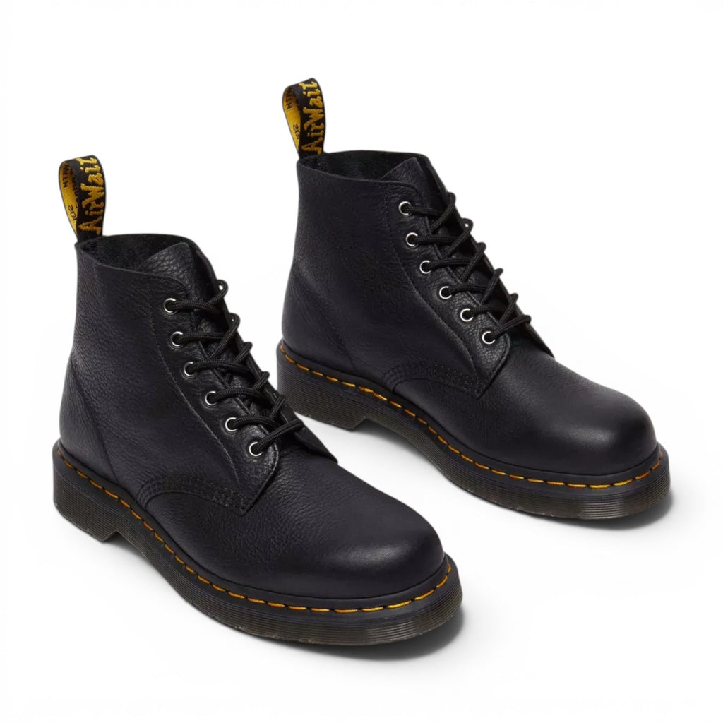 ShoeShop Dr. Martens 101 Ambassador black leather ankle boots with yellow welt stitching and heel pull tabs