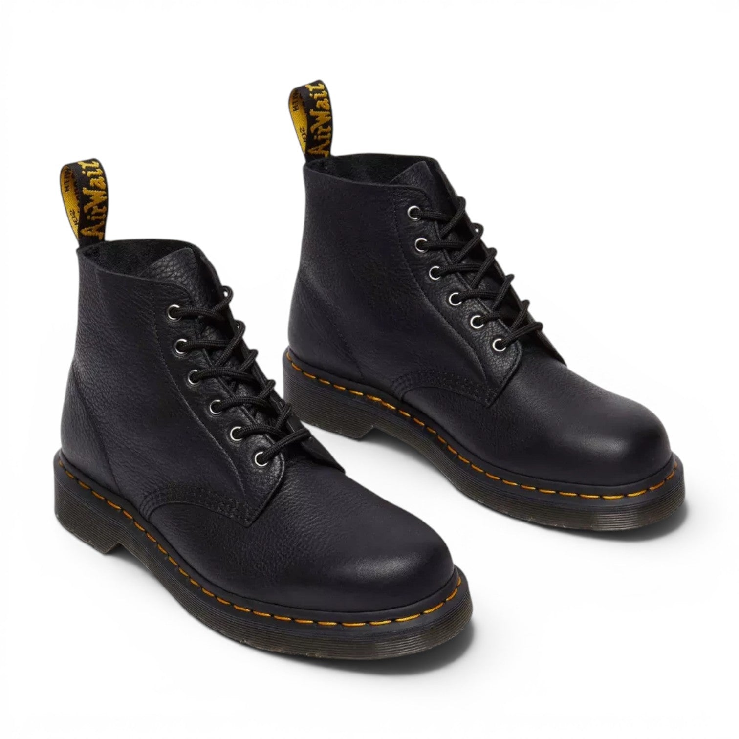 ShoeShop Dr. Martens 101 Ambassador black leather ankle boots with yellow welt stitching and heel pull tabs