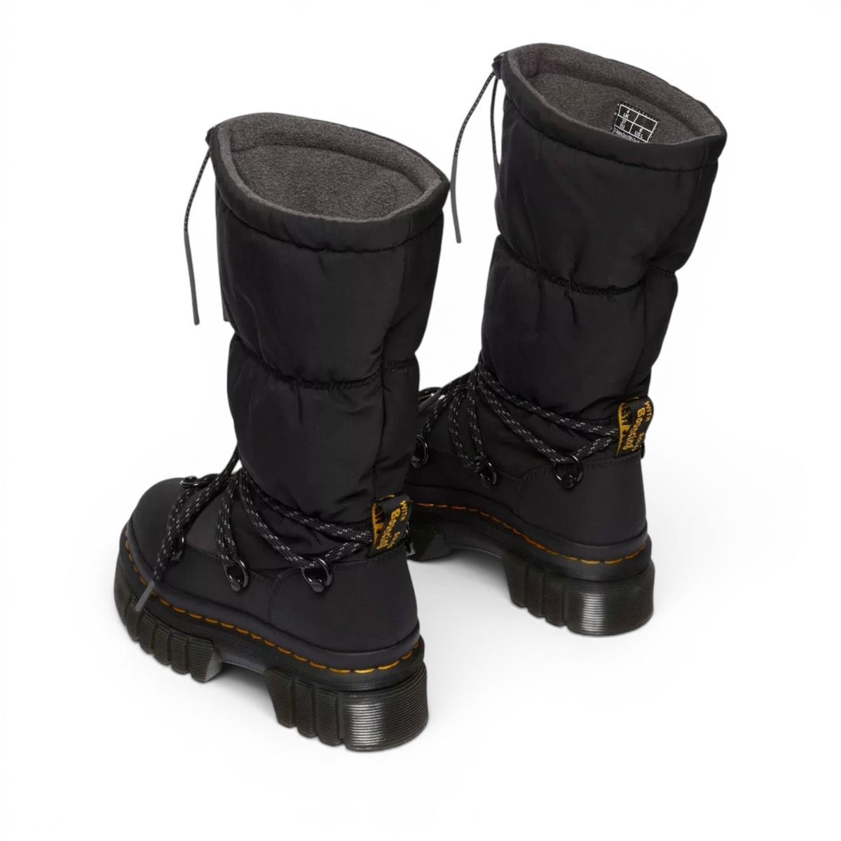 ShoeShop Dr. Martens Audrick Hi Puffer boots in black with fleece lining, chunky platform sole, and lace-up detail.