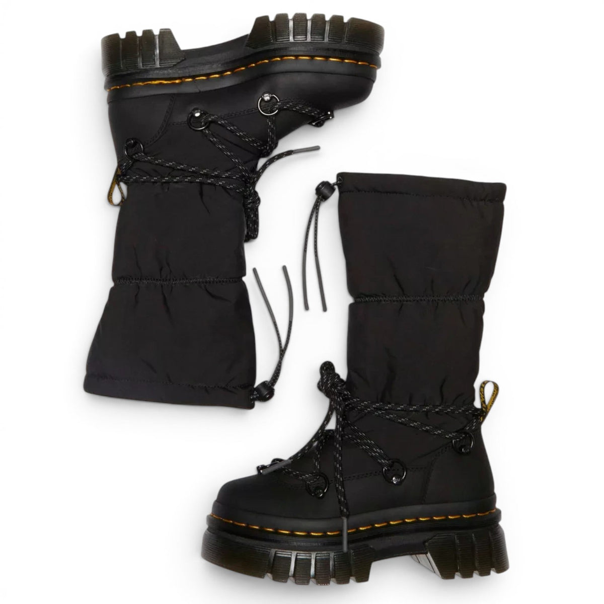 ShoeShop Dr. Martens Audrick Hi Puffer black boots with fleece lining, chunky platform sole, and lace-up closure.