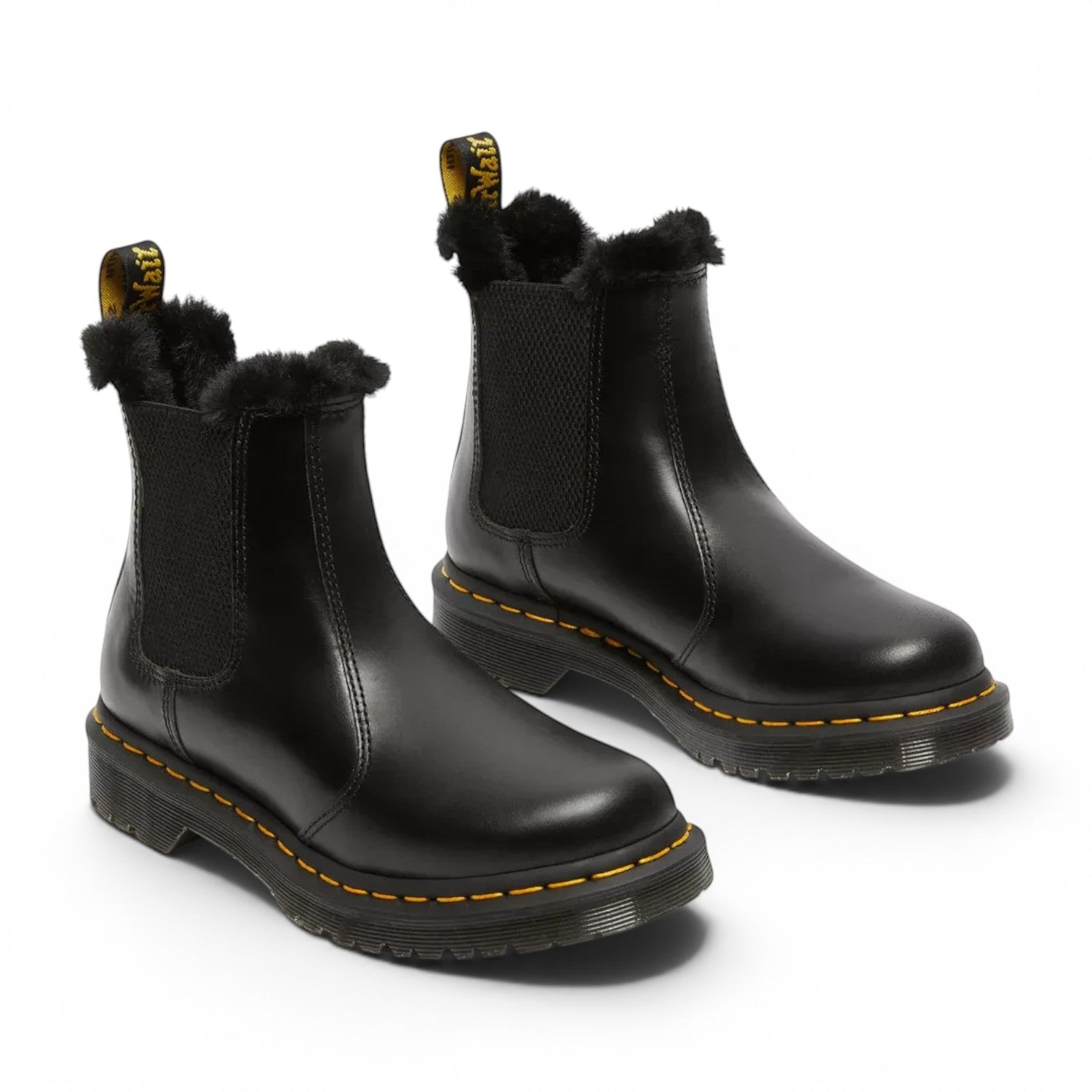 ShoeShop Dr. Martens black leather Chelsea boots with faux fur lining and signature yellow welt stitching